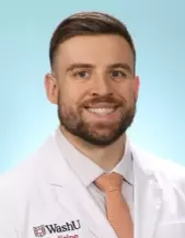 Photo of Dr. Ragsdale in lab coat