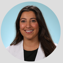 Photo of Theresa Simon, PA-C, in lab coat