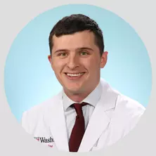 Photo of physician assistant Joe Sweet on a teal background in a white lab coat.
